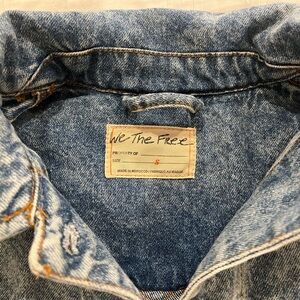 Free people oversized denim jacket. Button-front closure.